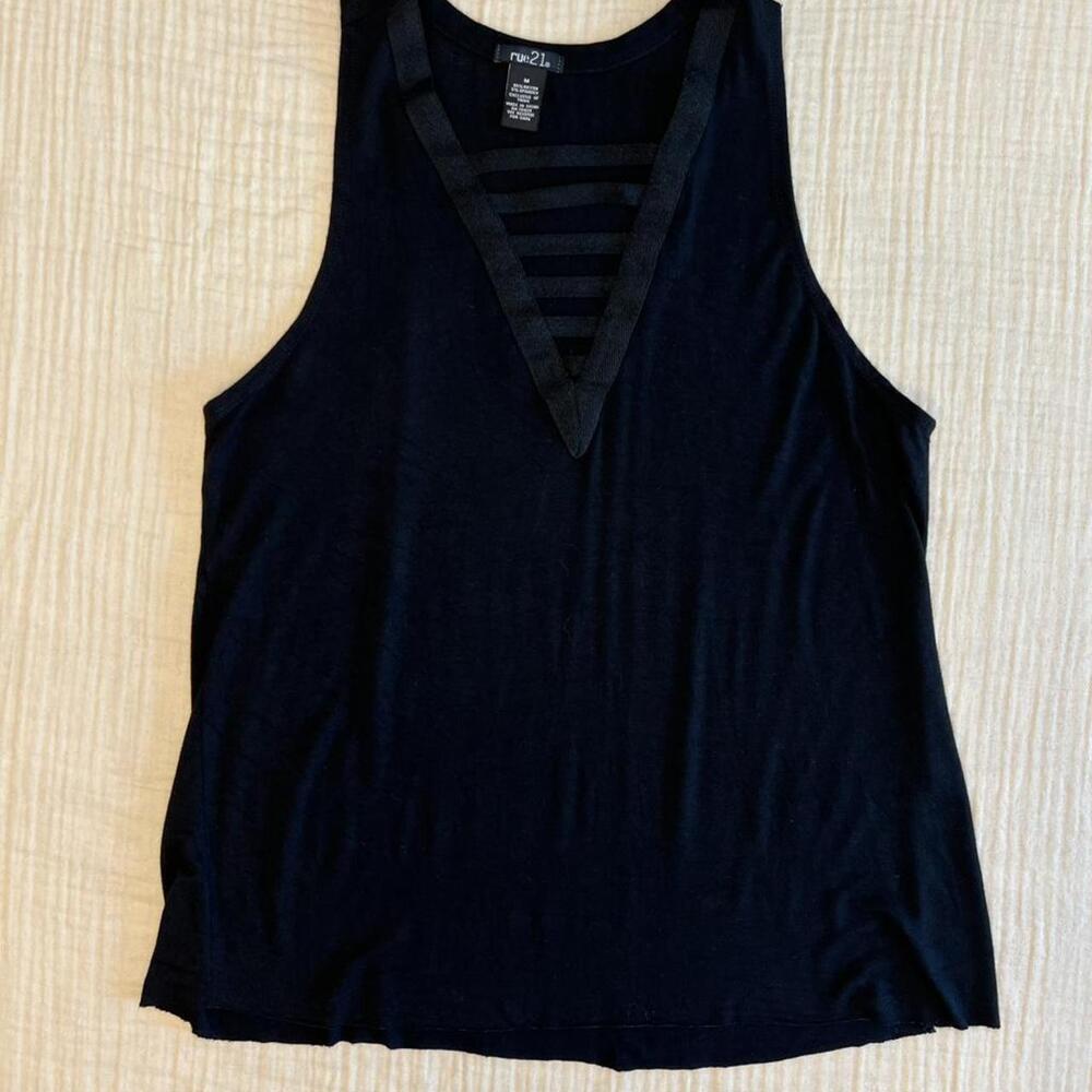 Rue21 black sleeveless tank top featuring a strappy cage detail inside a deep V-